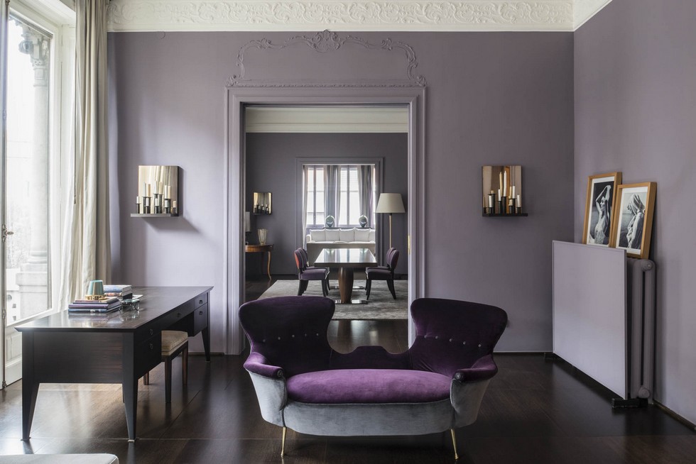 Sitting room area with purple sofas
